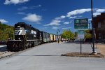 NS yard job E19 and the Depot Grille and city parking lot under a Kodachrome sky.  